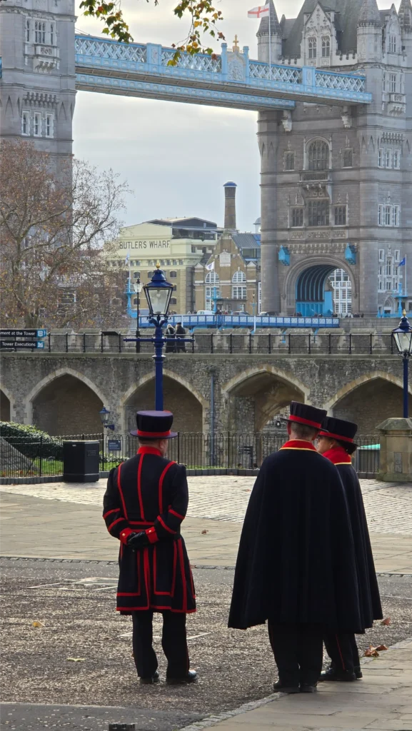 Beefeaters standing outside the Tower of London.